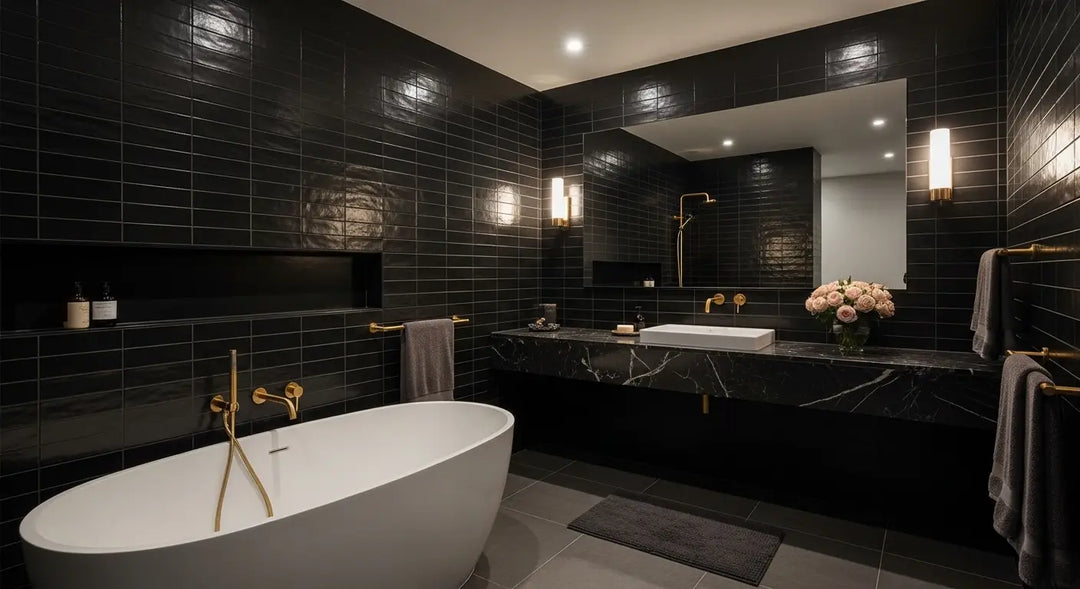 Luxury dark-themed Perth bathroom renovation 2025 with freestanding bathtub, rose flower accents, and elegant black tiles